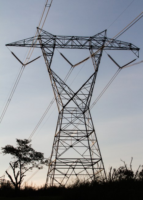 power line tower at sunrise