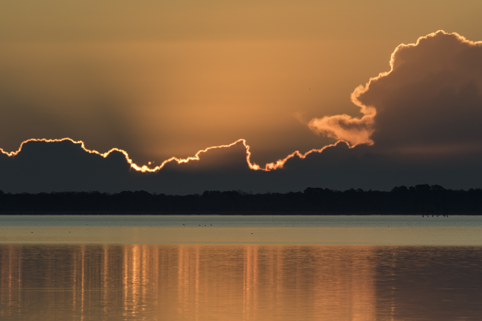 Golden lining to clouds at sunrise 1