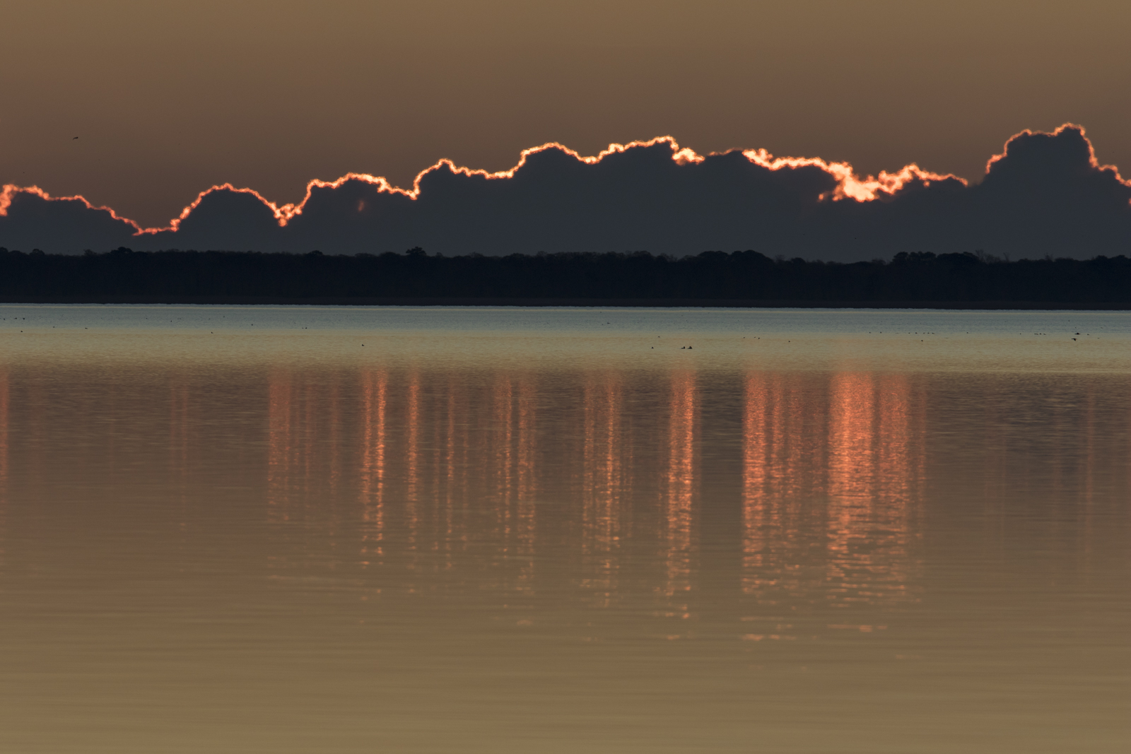 Golden lining to clouds at sunrise