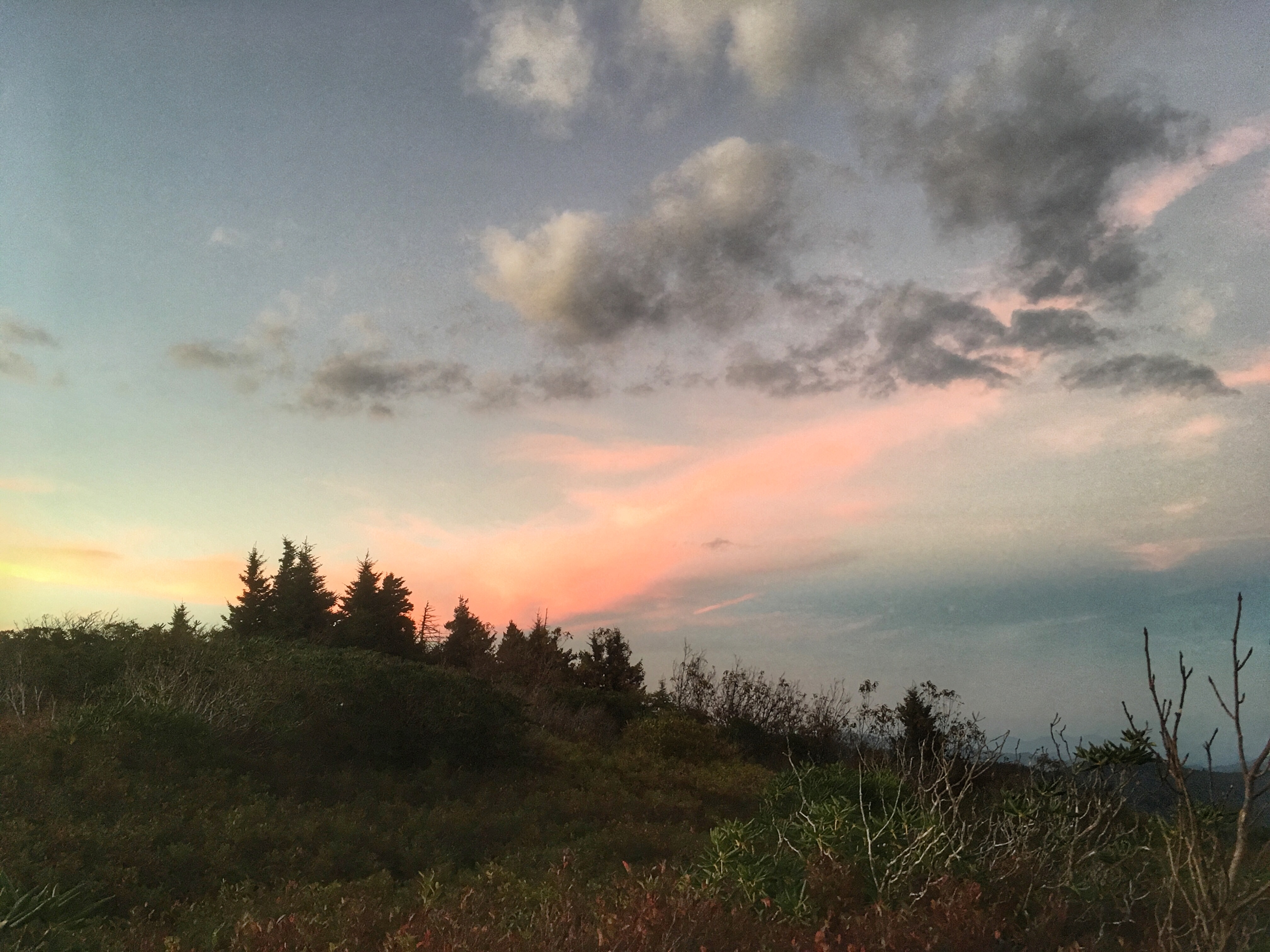sunset behind campsite